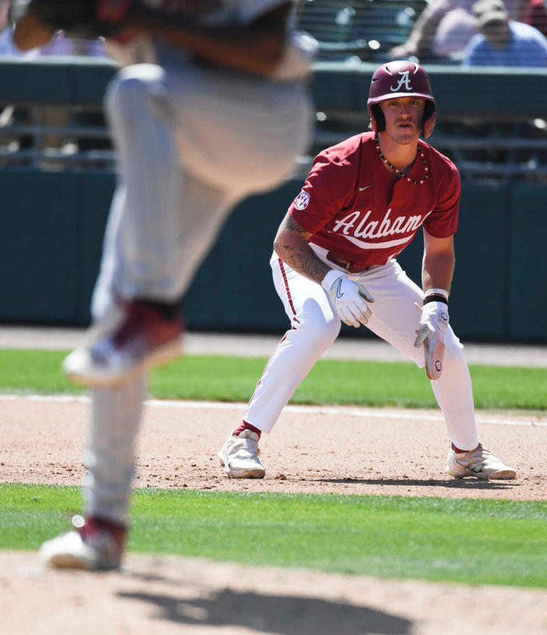 Alabama base runner Gage Miller (12), a Palmyra graduate, takes a lead as South Carolina pitcher Ty Good works from the stretch at Sewell-Thomas Stadium in the final game of the weekend series. South Carolina held on for a 9-8 victory.