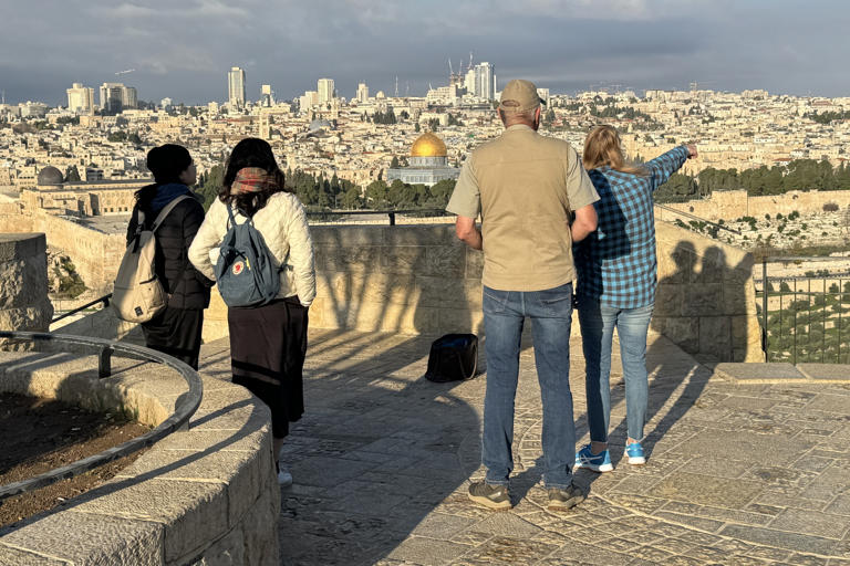 Visitors in front of the holy site known to Jews as the Temple Mount and to Muslims as Al Haram Ash Sharif in Jerusalem. The site is one of the most fiercely contested on earth and is the epicenter of the Middle East conflict. Matthew Tostevin