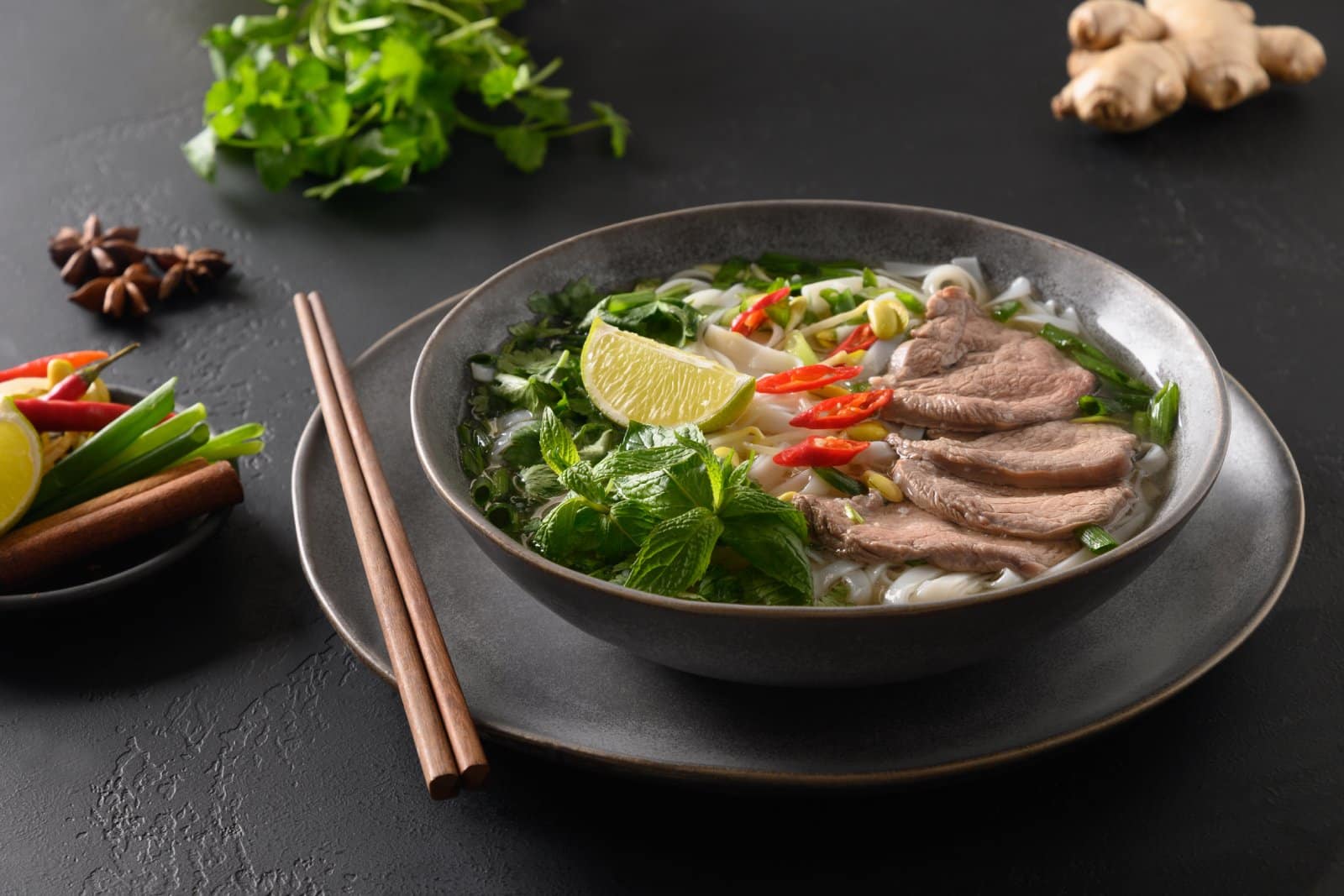 Image Credit: Shutterstock / Lazhko Svetlana <p>A fragrant Vietnamese soup with rice noodles, herbs, and meat, often chicken or beef, in a clear broth. Each bowl is a soothing balance of flavors and textures.</p>