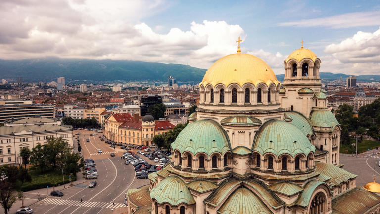 A photograph captures a panoramic view of Sofia, Bulgaria.