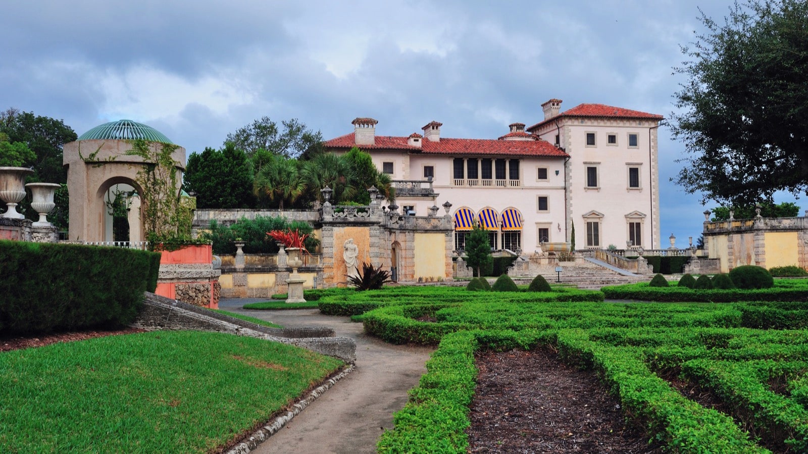 <p>A designated National Historic Landmark, the Vizcaya Museum and Gardens attracts hundreds of thousands of visitors annually.</p><p>The estate was commissioned to be built by James Deering, an American executive of the Deering Harvester Company, to rival those in Europe. Its final construction includes a pavilion, swimming pool, a cottage, and gardens with a reflecting pool and fountain, while historic art, furniture, and antiques decorate the estate's interior.</p>