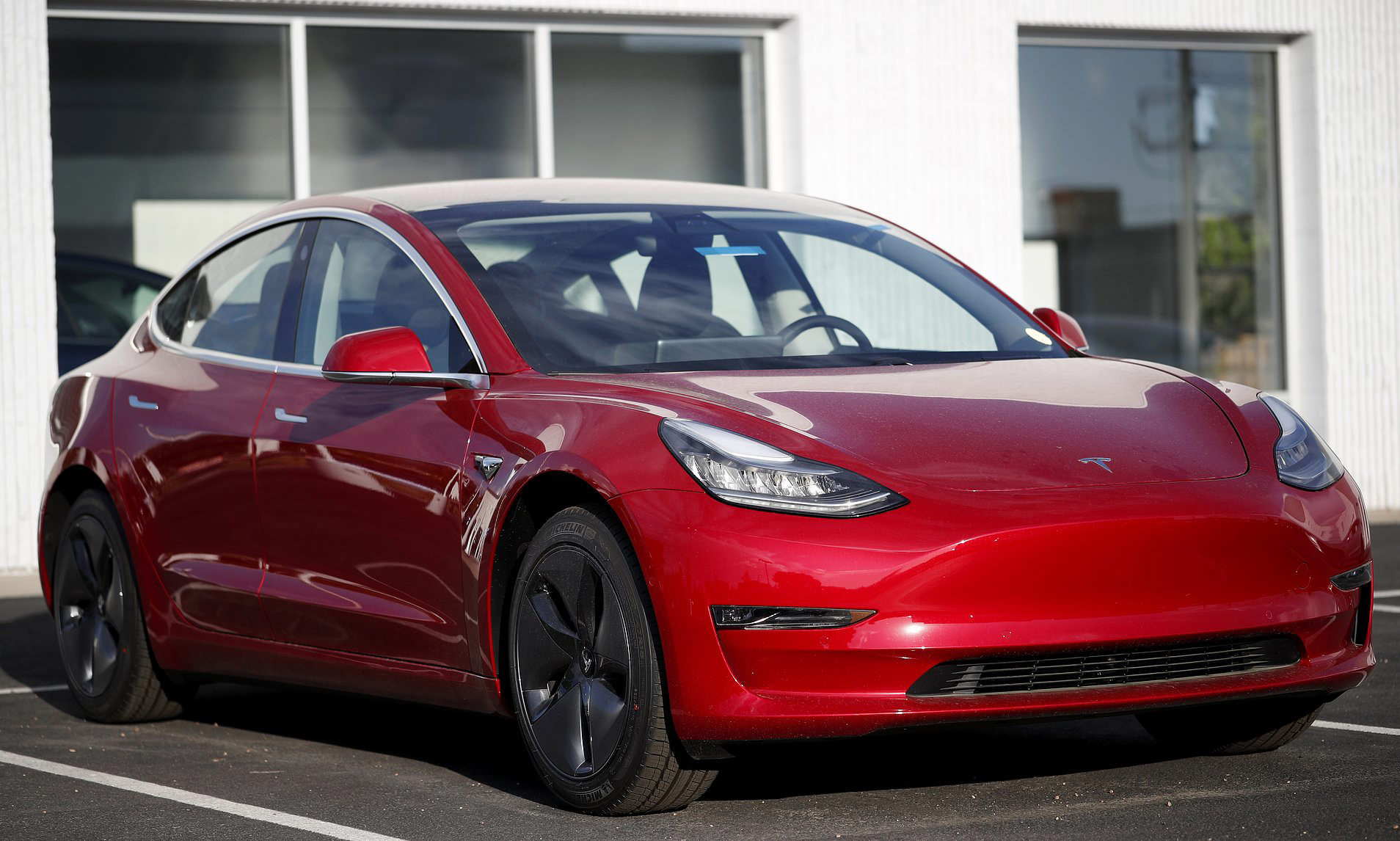 Tesla scraps its 'halfprice' 27,000 EV amid fierce competition from