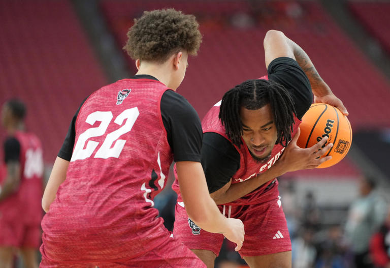 Apr 5, 2024; Glendale, AZ, USA; North Carolina State Wolfpack guard Jayden Taylor (1) and North Carolina State Wolfpack guard Jordan Snell (22) during practice before the 2024 Final Four of the NCAA Tournament at State Farm Stadium. Mandatory Credit: Bob Donnan-USA TODAY Sports