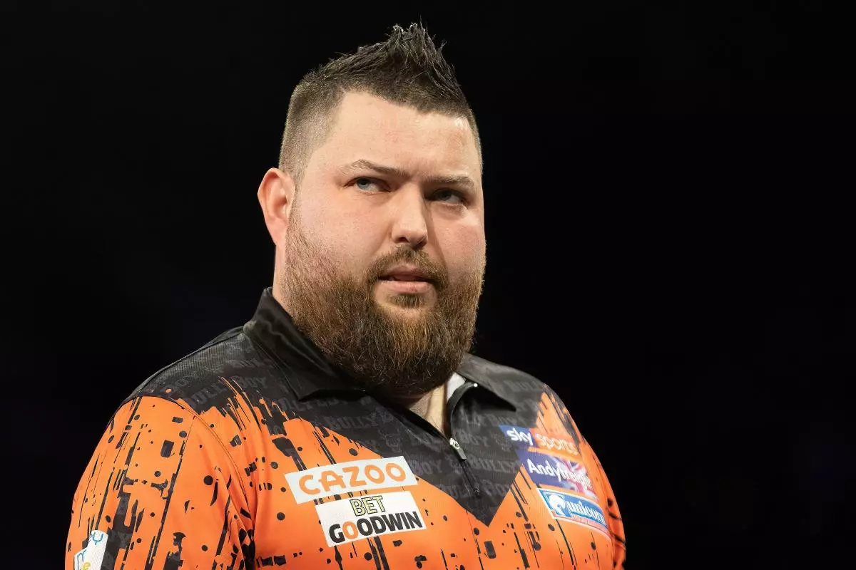 michael smith suffers early exit in international darts open