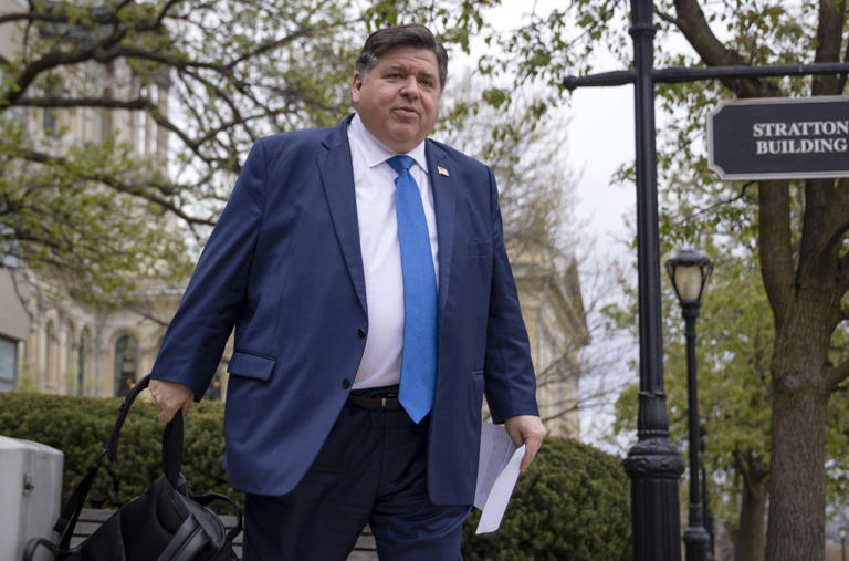 Gov. J.B. Pritzker departs the Illinois State Capitol complex in Springfield on April 10, 2024.