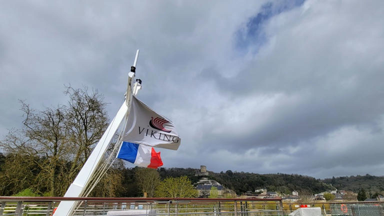 The Viking Radgrid's flag waves on the upper deck while docked in La Roche-Guyon, a small town along the River Seine.