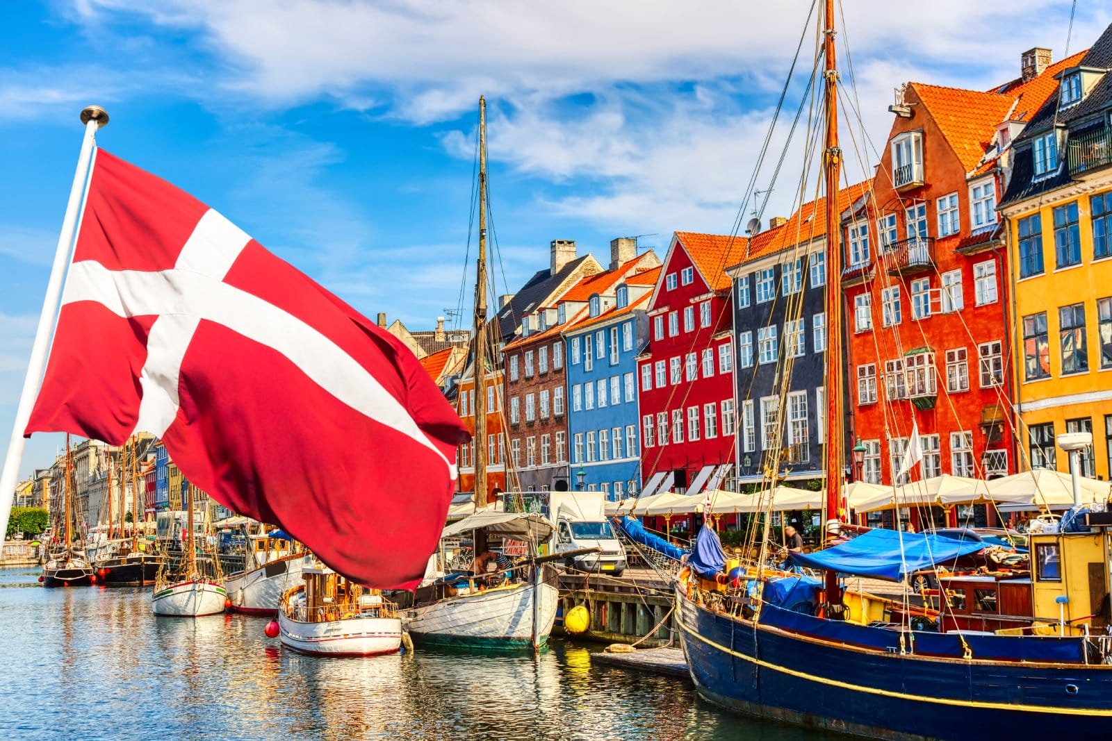 <p class="wp-caption-text">Image Credit: Shutterstock / Nick N A</p>  <p><span>Denmark ranks high in safety and happiness, and Copenhagen’s historic harbor, Nyhavn, is a testament to the city’s charm with its colorful townhouses and wooden ships.</span></p>