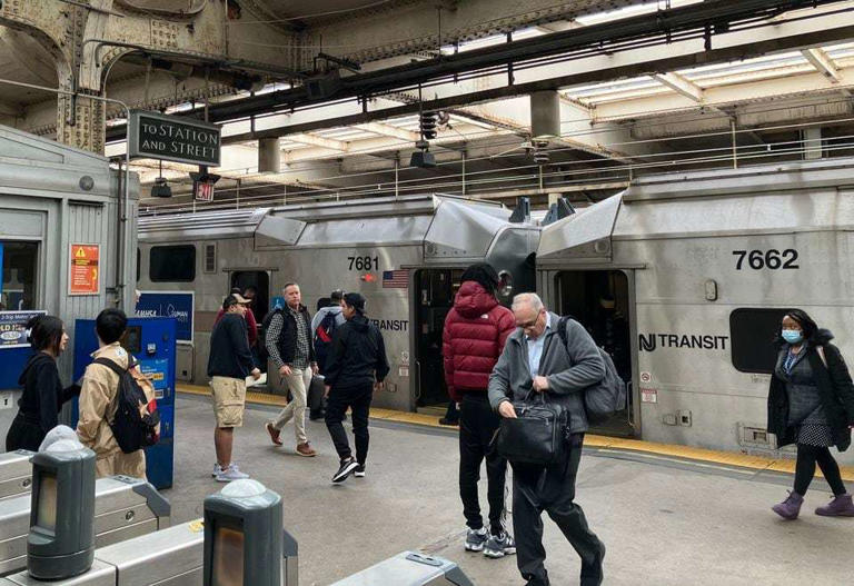 Passengers get off an NJ Transit train in Newark Penn Station on April 10 and transfer to the PATH system to lower Manhattan. A fare increase approved that day takes effect July 1 but leaves the agency with funding issues until a proposed corporate transit fee is approved.
