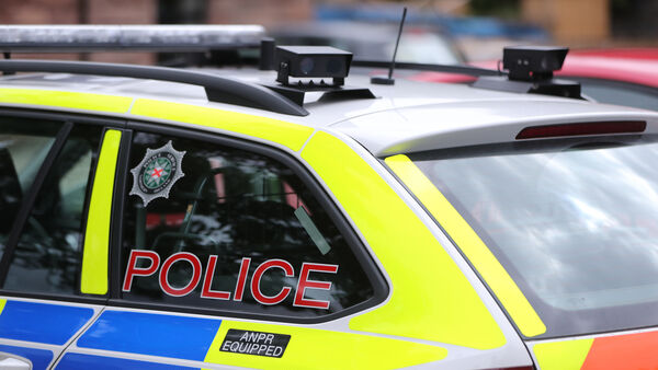 two officers and a motorist injured in police car collision