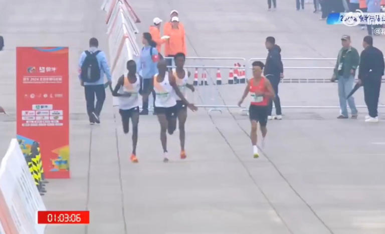 African runners appear to let Chinese star win Beijing race in bizarre ...