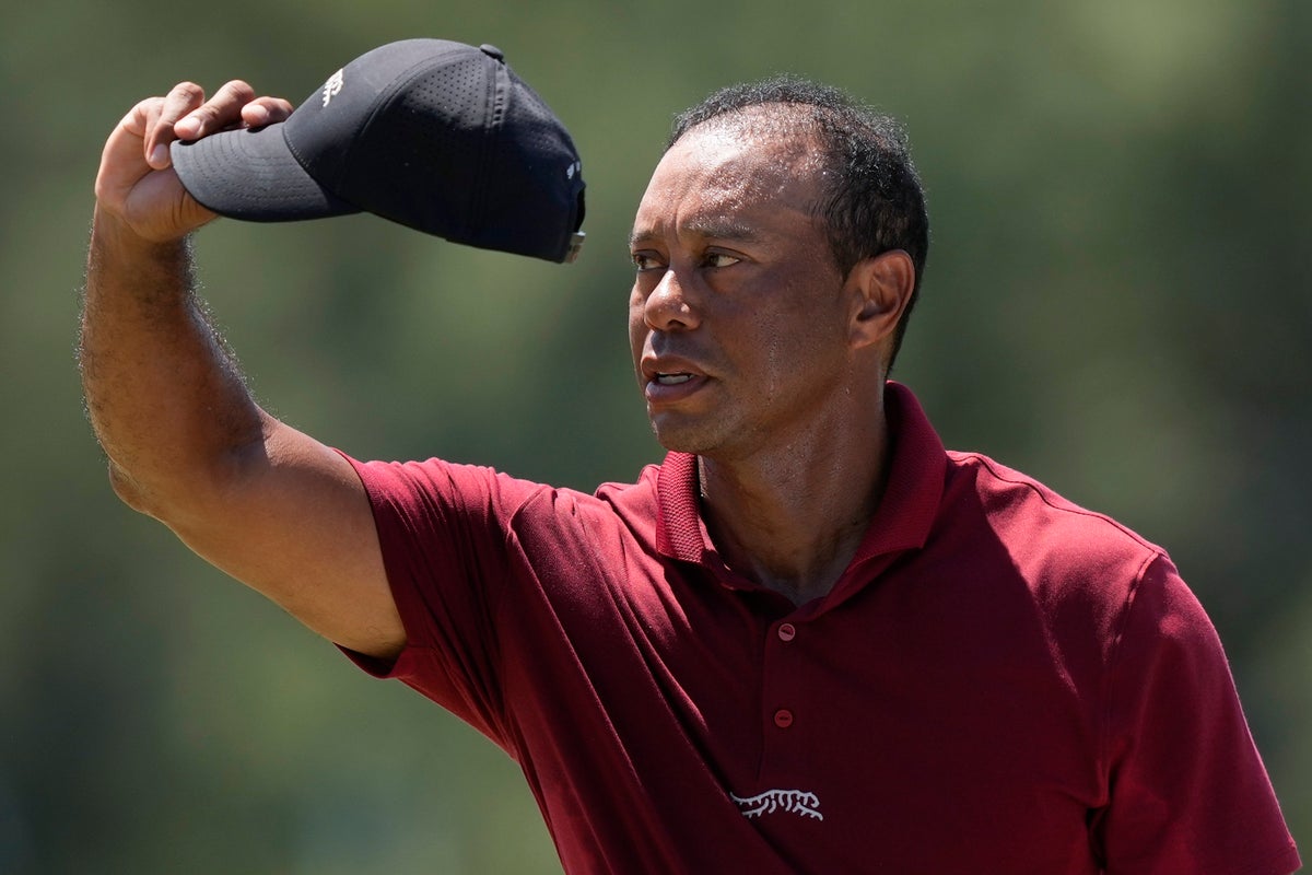 the masters: tiger woods bounces back for battling finish after son's advice