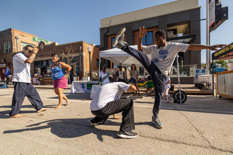 Lawrence French and Luis Muela of Fort Worth Capoeira do a Brazilian Martial Arts demonstration at Open Streets.