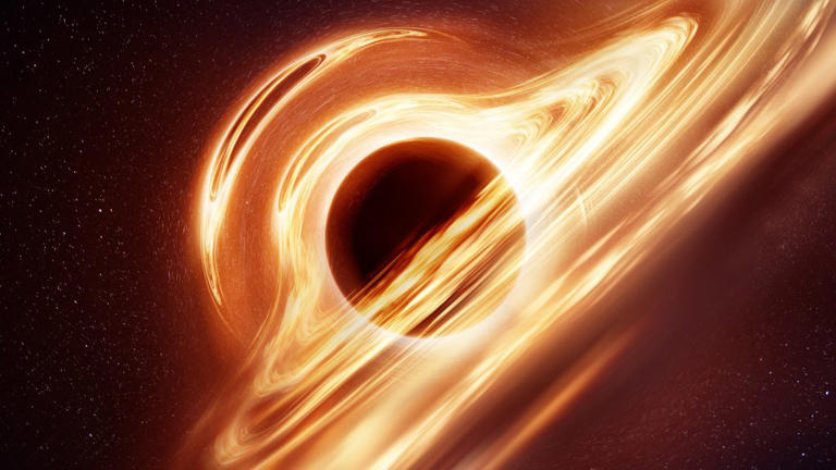 An illustration of what a black hole with an accretion disk may look like based on modern understanding. The extreme gravitational fields create huge distortions in the hot matter and gas rotating forwards the black hole.