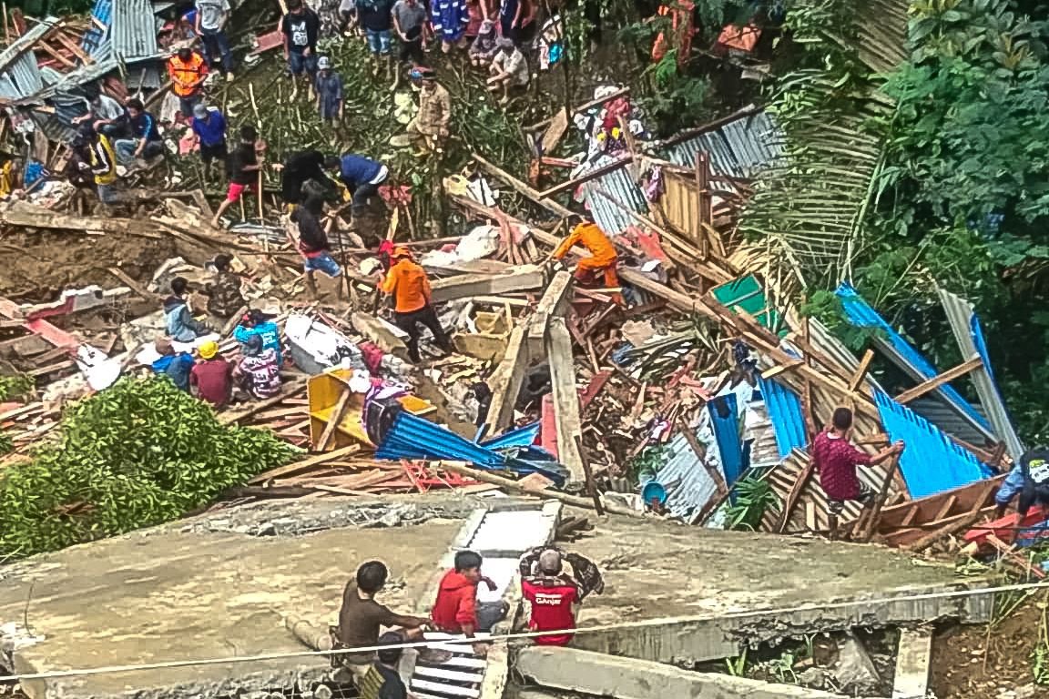 18 dead and more missing after landslides hit indonesia
