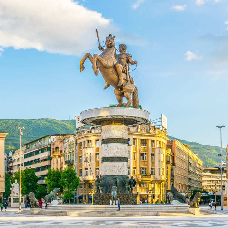 Believe it or not, the number one nomad destination ‘surging' right now is an unheard-of, post-communist, seriously underrated city that is most likely <em>not</em> on your travel radar this year: Skopje, the quirky, statue-packed capital of landlocked <a href="https://www.traveloffpath.com/why-this-gorgeous-european-region-will-become-a-digital-nomad-hotspot-for-2024/" rel="noreferrer noopener">North Macedonia</a>. It is distinct for its delectable South Slavic cuisine, Macedonian culture, and association with the legendary Alexander the Great, who they claim, to the dismay of Greeks, and whose golden-washed sculpture mounting his horse stands proudly in the center of town and medieval landmarks. Skopje<strong> ticks all the boxes </strong>for what makes a European capital great: the cobbled historic zone, lined by traditional eateries and souvenir shops, the ancient castle, perched on a hill overlooking the conurbation below, and the wide, leafy boulevards, except it is not prohibitively expensive. Based on<em> Nomad List</em> estimates, living in Skopje will cost you between $830 if you're the frugal type who doesn't eat in restaurants often and is fine with one-bedroom rentals, and $1,349 if you don't mind treating yourself to a spacious apartment and nice dinners in the <em>Centar</em> on occasion. <div class="wp-block-post-author__content">   <p class="wp-block-post-author__name"><a href="https://www.traveloffpath.com/author/vinicius-costa/">Vinicius Costa</a></p>   <p class="wp-block-post-author__bio">Vini, our senior lead writer at Travel Off Path, has over 60+ countries under his belt (and currently weaving tales from Paris!), and a knack for turning off-the-beaten-path experiences into informative stories that will have you packing your bags.</p>  </div> <strong>↓ Join Our Community ↓</strong> The <a href="https://www.facebook.com/groups/traveloffpath" rel="noreferrer noopener"><strong>Travel Off Path Community FB group</strong> </a>has all the latest travel news, conversations, and Q&A's happening daily!