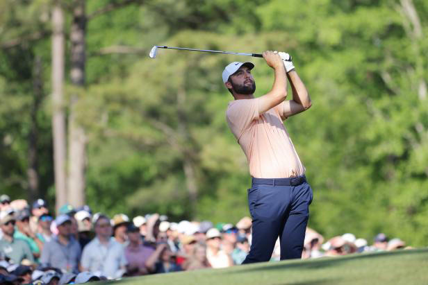 AUGUSTA, GEORGIA - APRIL 14: Scottie Scheffler of the United States plays his shot from the 12th tee during the final round of the 2024 Masters Tournament at Augusta National Golf Club on April 14, 2024 in Augusta, Georgia. (Photo by Jamie Squire/Getty Images)