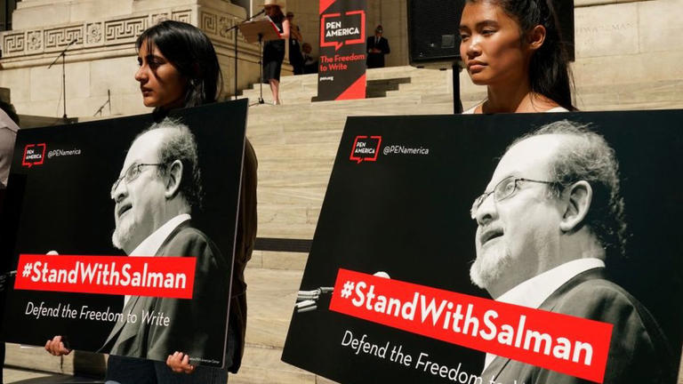 A rally to show solidarity for free expression was held in New York after Sir Salman was attacked
