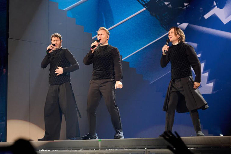 Take That's Howard, Gary and Mark on stage on the opening night of the new This Life on Tour in Sheffield