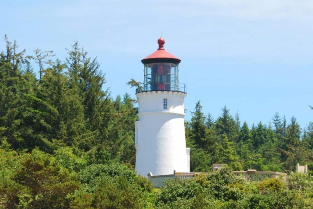 <p><strong>Year lit:</strong> 1894</p><p><strong>Height:</strong> 65 feet</p><p>You may notice that the Umpqua River Lighthouse looks like the Heceta Head Lighthouse. Architecturally, it is nearly identical. However, the lens is quite different. It is the only Oregon Coast lighthouse emitting red and white light.</p><p>The signal is at MilePost 215.6 on the Oregon Coast Highway at Umpqua Lighthouse State Park in Winchester Bay. It is open daily except for major holidays. During the tour, you can learn how lensmakers turned the glass red.</p>