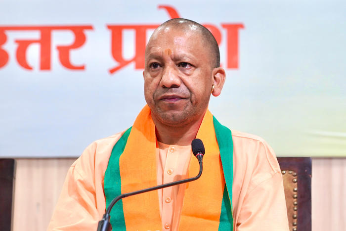 cm yogi directs officials to resolve people's issues promptly, take stern action against encroachers