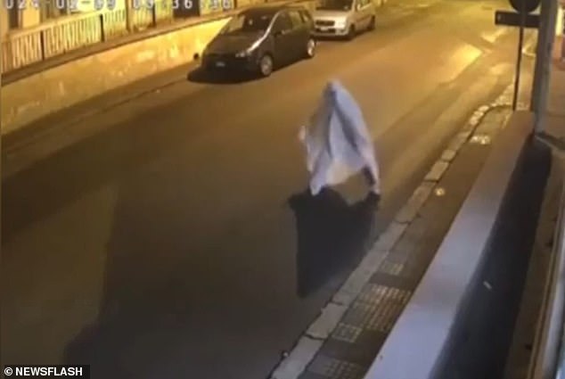 jilted italian stalks his former wife by disguising himself as a ghost