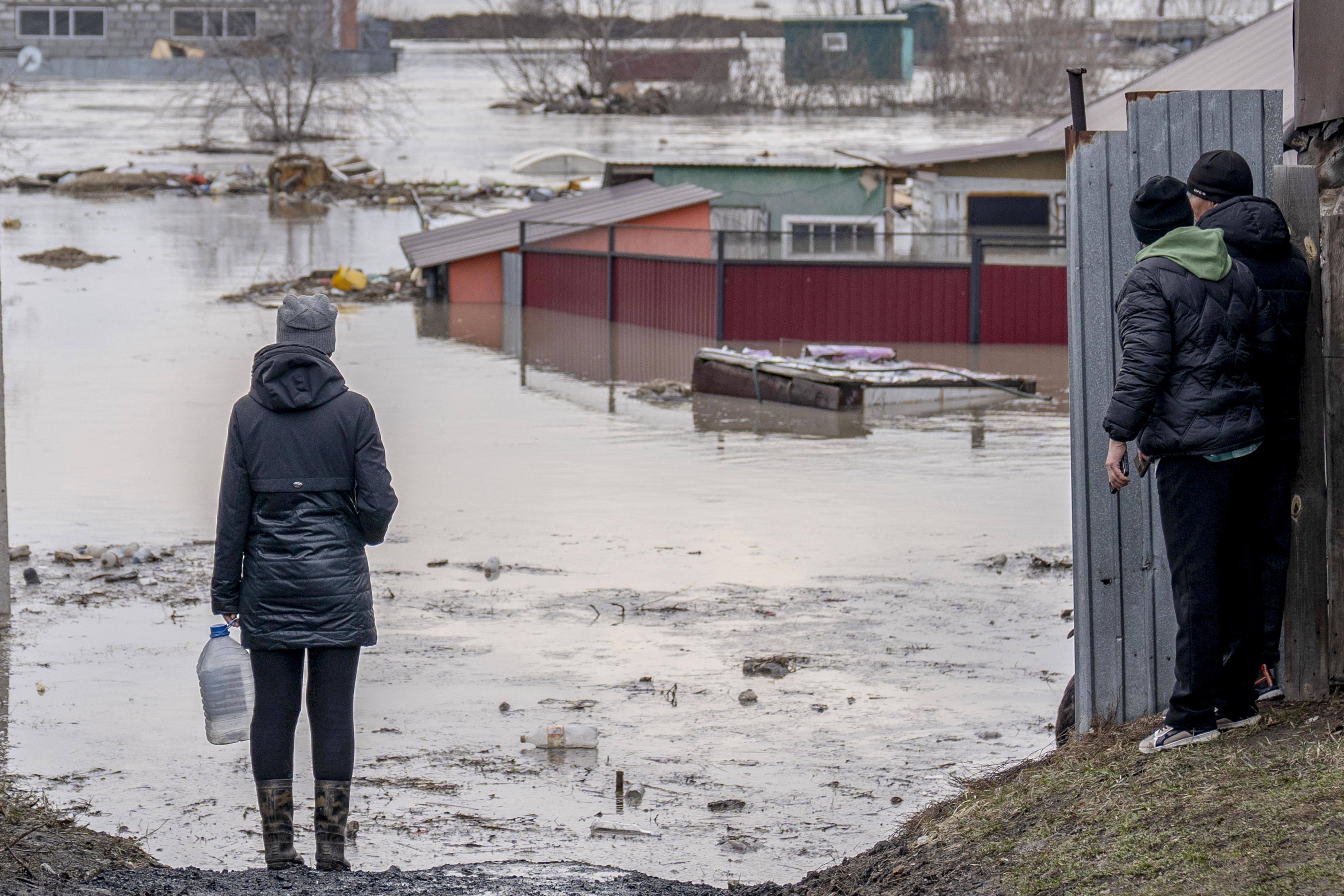 floods kill dozens, force thousands to flee in russia and central asia