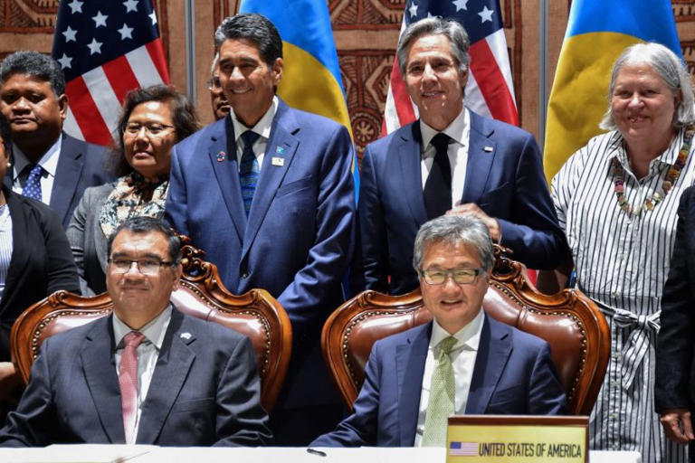 US secretary of state Antony Blinken (back row R) and Palau's president Surangel Whipps (back row L) pose for photos after the signing of Compact Review Agreement by chief representatives, Palau finance minister Kaleb Udui Jr (L) and the US special presidential envoy Joseph Yun (R) following the US-Pacific Islands Forum at the APEC Haus in Port Moresby on May 22, 2023. (Andrew Kutan / AFP via Getty Images)