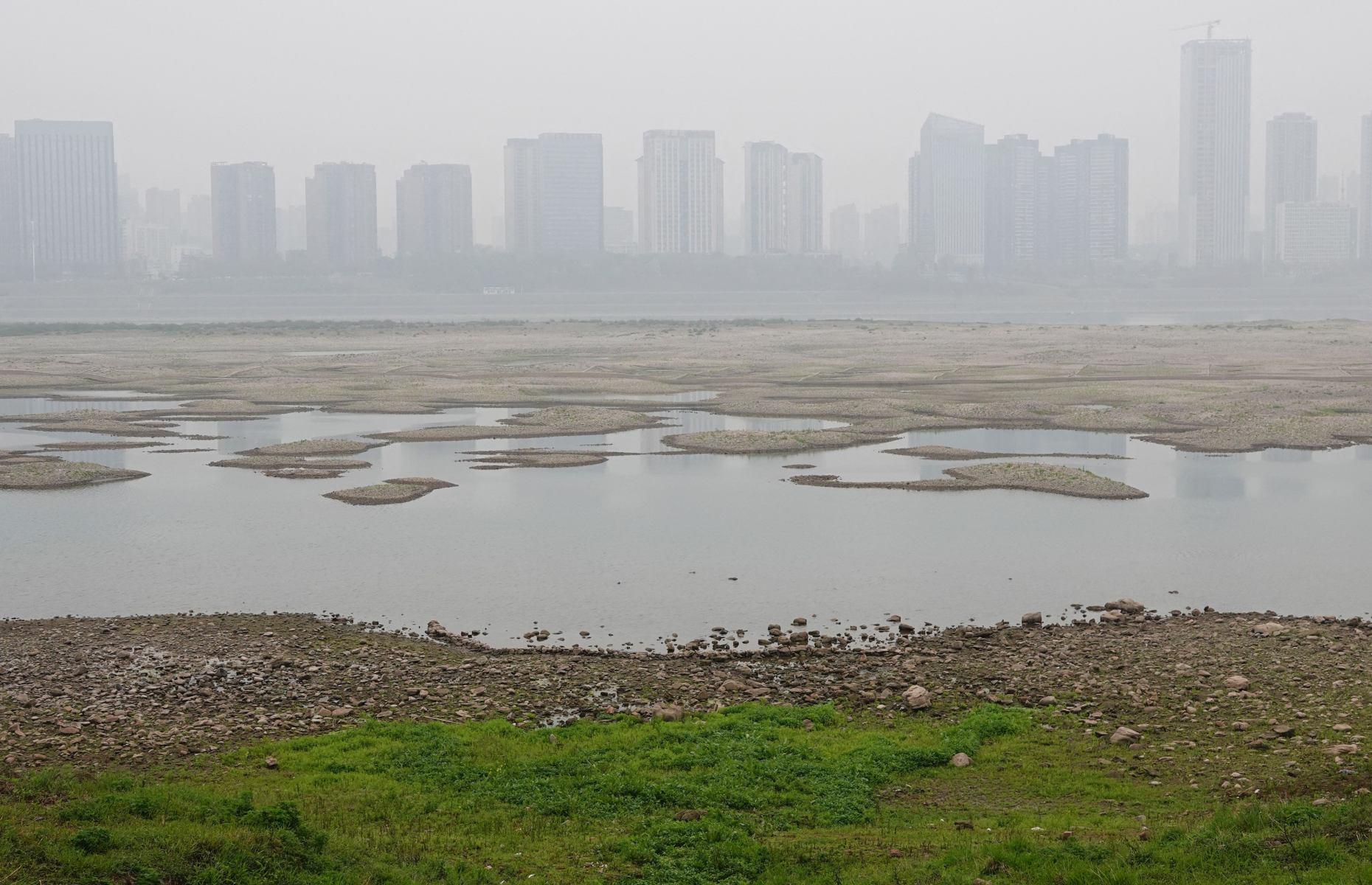 <p>China’s most important river has been bearing the brunt of the climate crisis for years, with fluctuations in its flow resulting in both flooding and water scarcity. Things came to a head in 2022 when China declared a nationwide drought for the first time in nine years, which devastated vital hydropower supplies and dried up the Yangtze. As the river is fed by glaciers in the Himalayas, it is especially vulnerable to global warming: increased glacial melt leads to flooding, while long-term retreat could starve the river of its source. This image shows the Yangtze’s parched riverbed at Yichang in March 2023.</p>