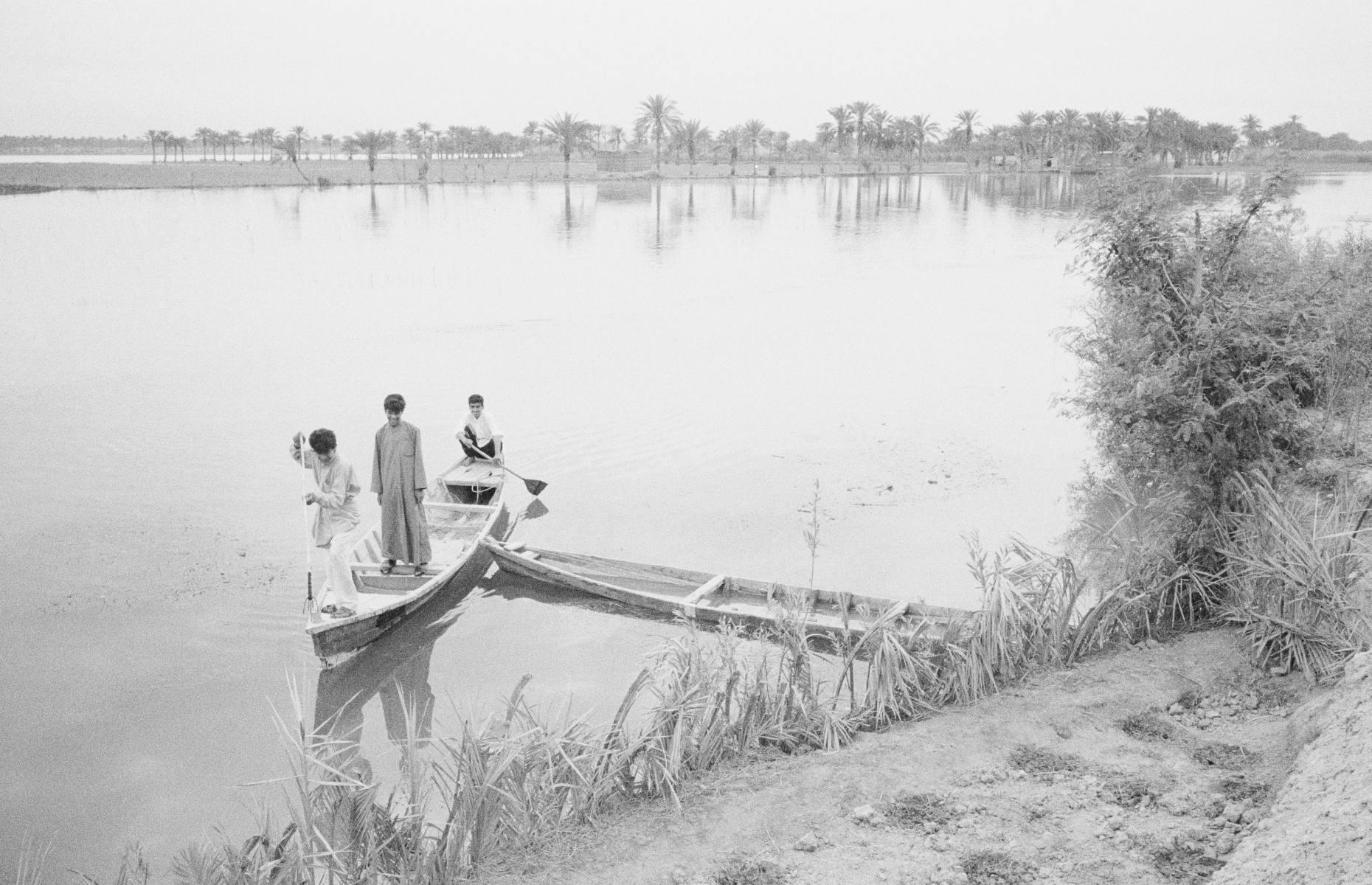 <p>The history of the ancient Tigris is entwined with that of civilisation itself. Along its banks is where humans first developed concepts such as agriculture, writing, beer brewing and the wheel – it is also said to have watered the biblical Garden of Eden. Once belonging to Mesopotamia, the Tigris River now predominantly courses through modern-day Iraq, including the cities of Mosul and Baghdad. It empties into the Persian Gulf together with its twin river, the Euphrates. This image of boys boating on the Tigris dates back to 1995.</p>