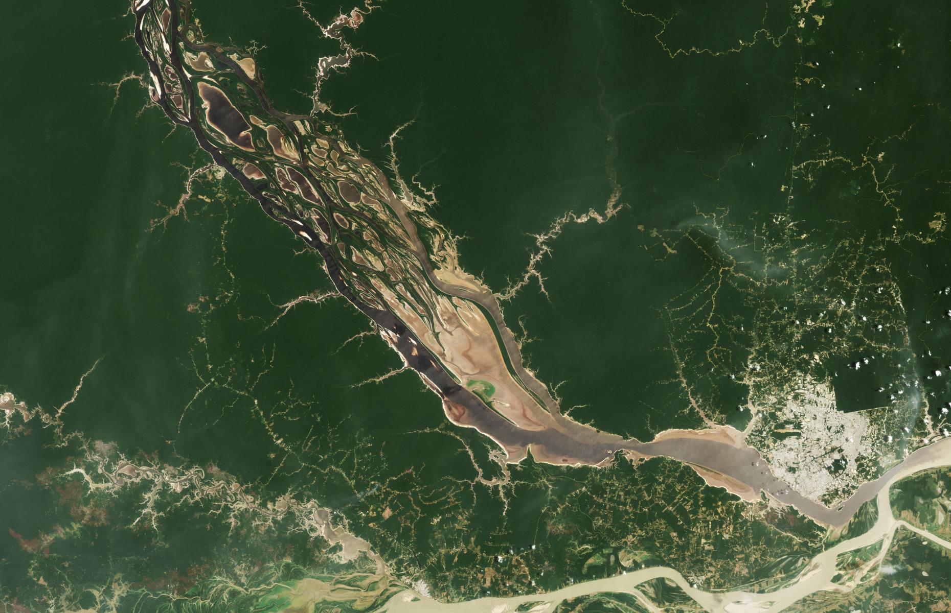 <p>But throughout 2023, the Amazonas region was rocked by a historic drought which scientists have since primarily attributed to climate change. River levels at Manaus on Monday 16 October registered at 44.6 feet (13.59m) – their lowest since records began 121 years ago. This image shows the Rio Negro just a week prior, on 3 October, when its water level was at 50.5 feet (15.14m). The months-long spell of no rain cut off remote villages and stranded boats, with high water temperatures blamed for the deaths of more than 100 endangered river dolphins.</p>  <p><strong><a href="https://www.loveexploring.com/galleries/127746/shocking-reasons-why-we-cant-ignore-climate-change-anymore">Now check out more images that show why we can no longer ignore the climate crisis</a></strong></p>  <p><strong>Liked this? Click on the Follow button above for more great stories from loveEXPLORING.</strong></p>