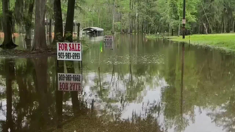 Roads, structures underwater around Caddo Lake due to flooding