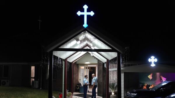 knife attack against bishop and priest being treated as terrorism, police say