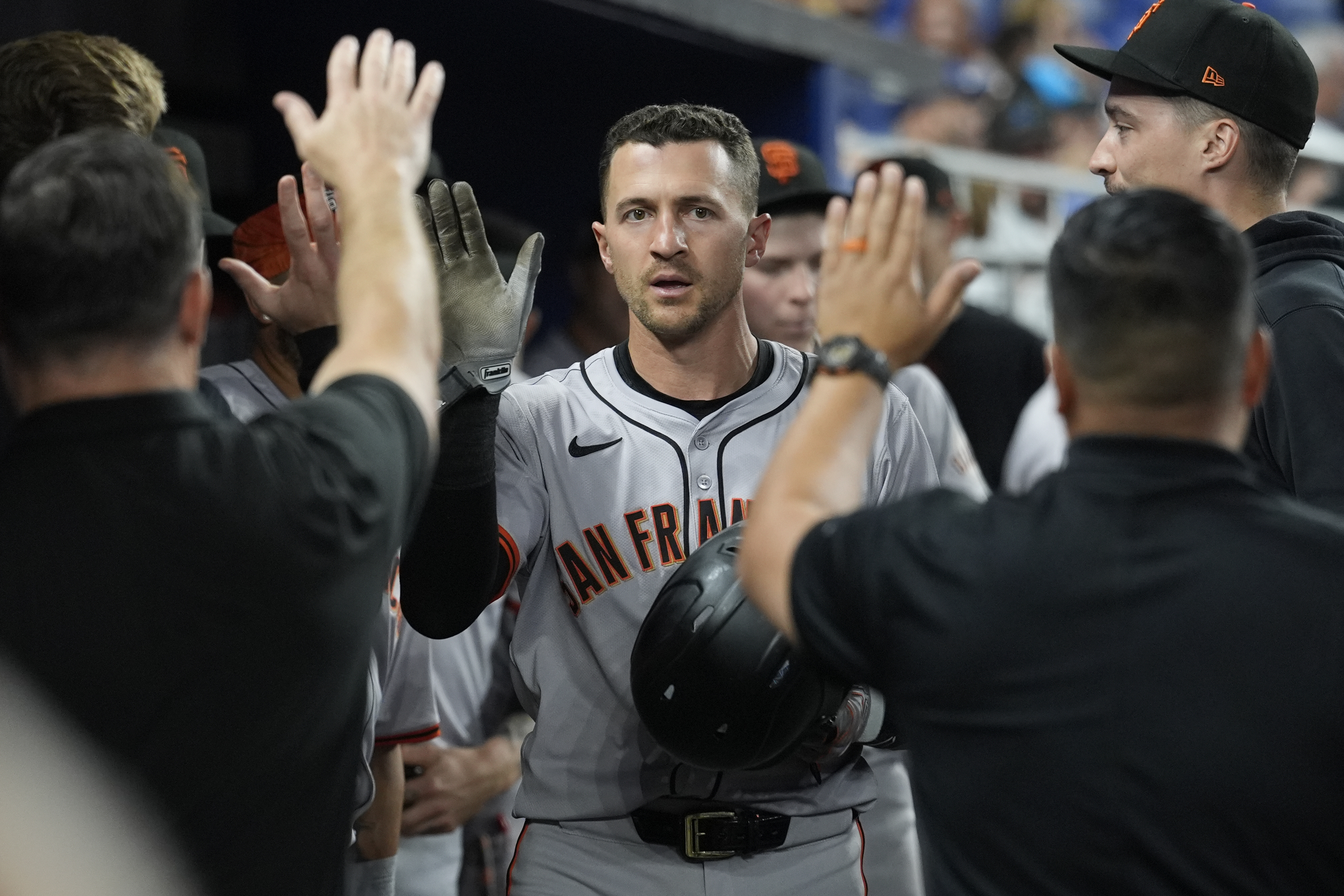 giants rally with 3 runs in 7th to beat nl-worst marlins. miami manager skip schumaker is tossed