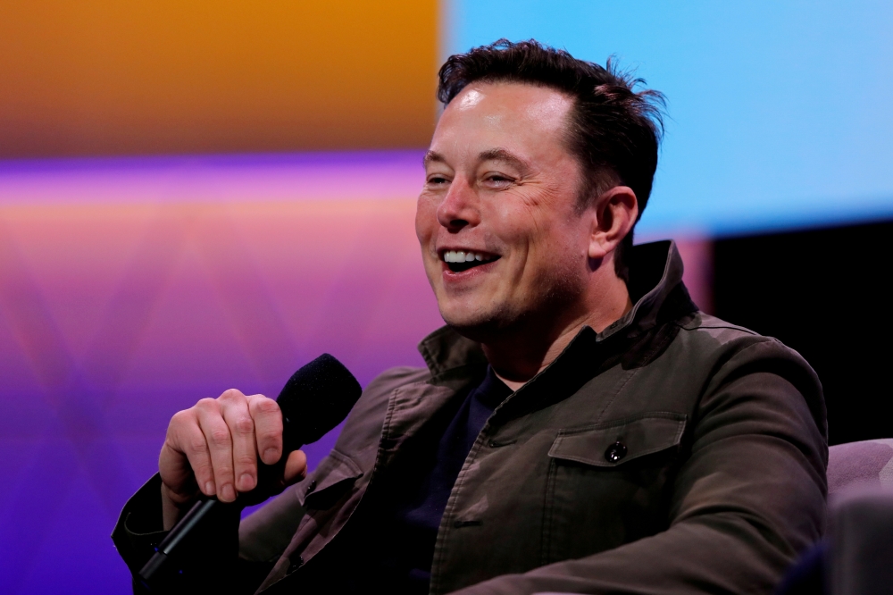 elon musk plans to make new x users pay to post for the first three months