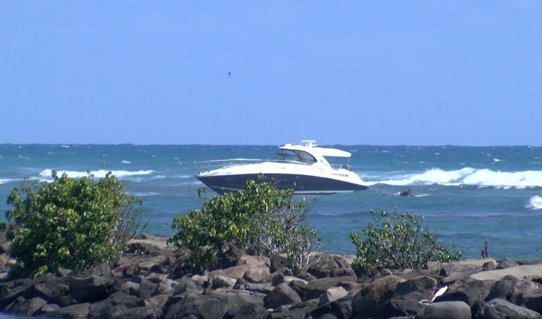 Boat runs aground near Rock Piles in Waikiki.