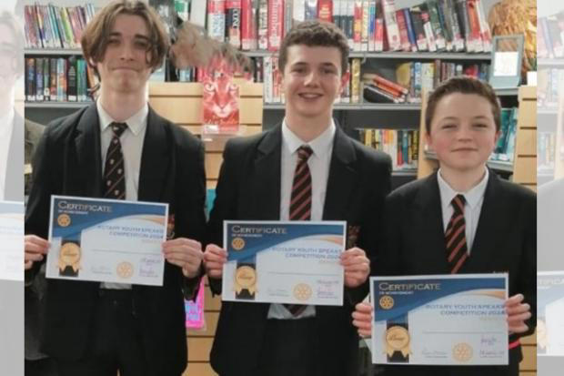 Aaron, Oliver and Jack from Birkenhead School took on a team from Wirral Grammar School for Boys in the 'Youth Speaks' contest (Image: Ro Murphy / Birkenhead Rotary)