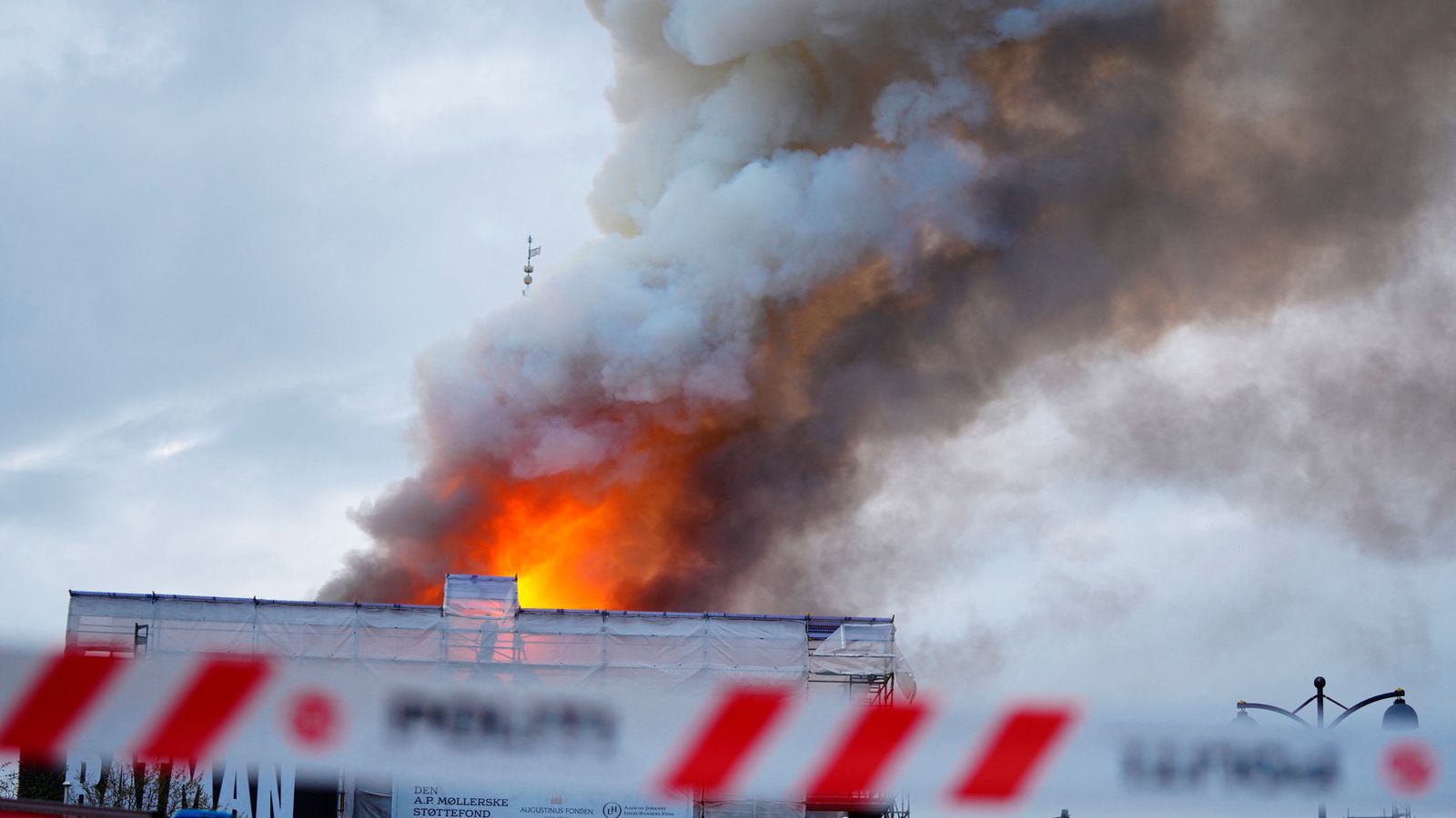 fire breaks out at one of copenhagen's oldest buildings - as spire collapses