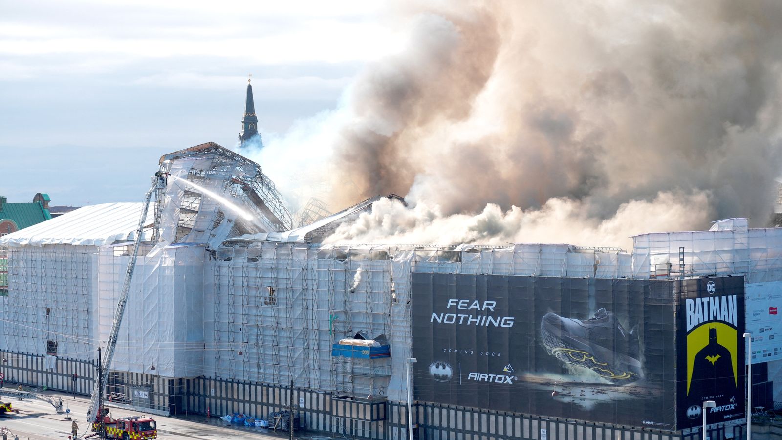 fire breaks out at one of copenhagen's oldest buildings - as spire collapses