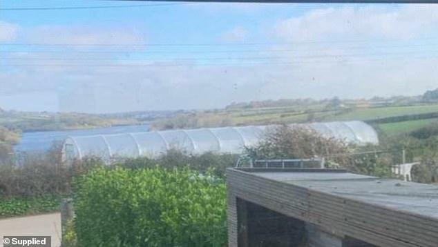 'industrial size polytunnel' blocks views of nearby reservoir