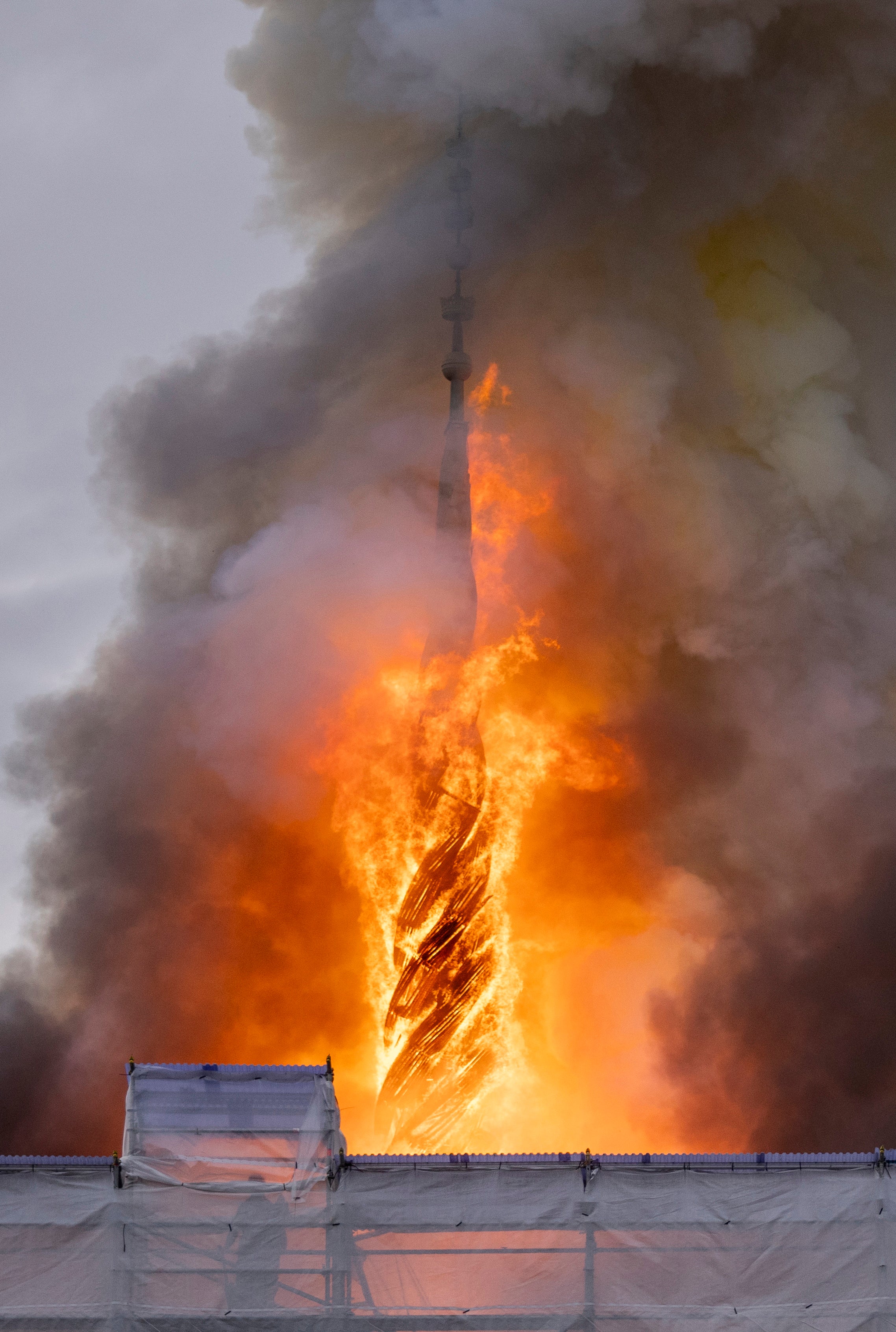 copenhagen fire: spire of historic stock exchange collapses in inferno