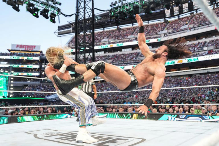 Drew McIntyre (R) in action against Seth Rollins during Night Two of WrestleMania 40.