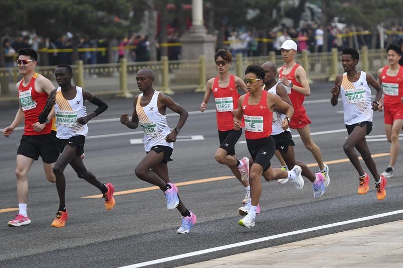 beijing half marathon results under investigation after runners appear to hand win to chinese star