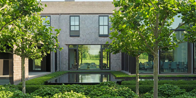 This Hamptons Landscape Uses Reflecting Pools To Mirror The Home's 