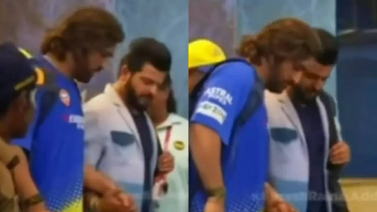 suresh raina supports limping ms dhoni on stairs after mi-csk clash; video goes viral - watch