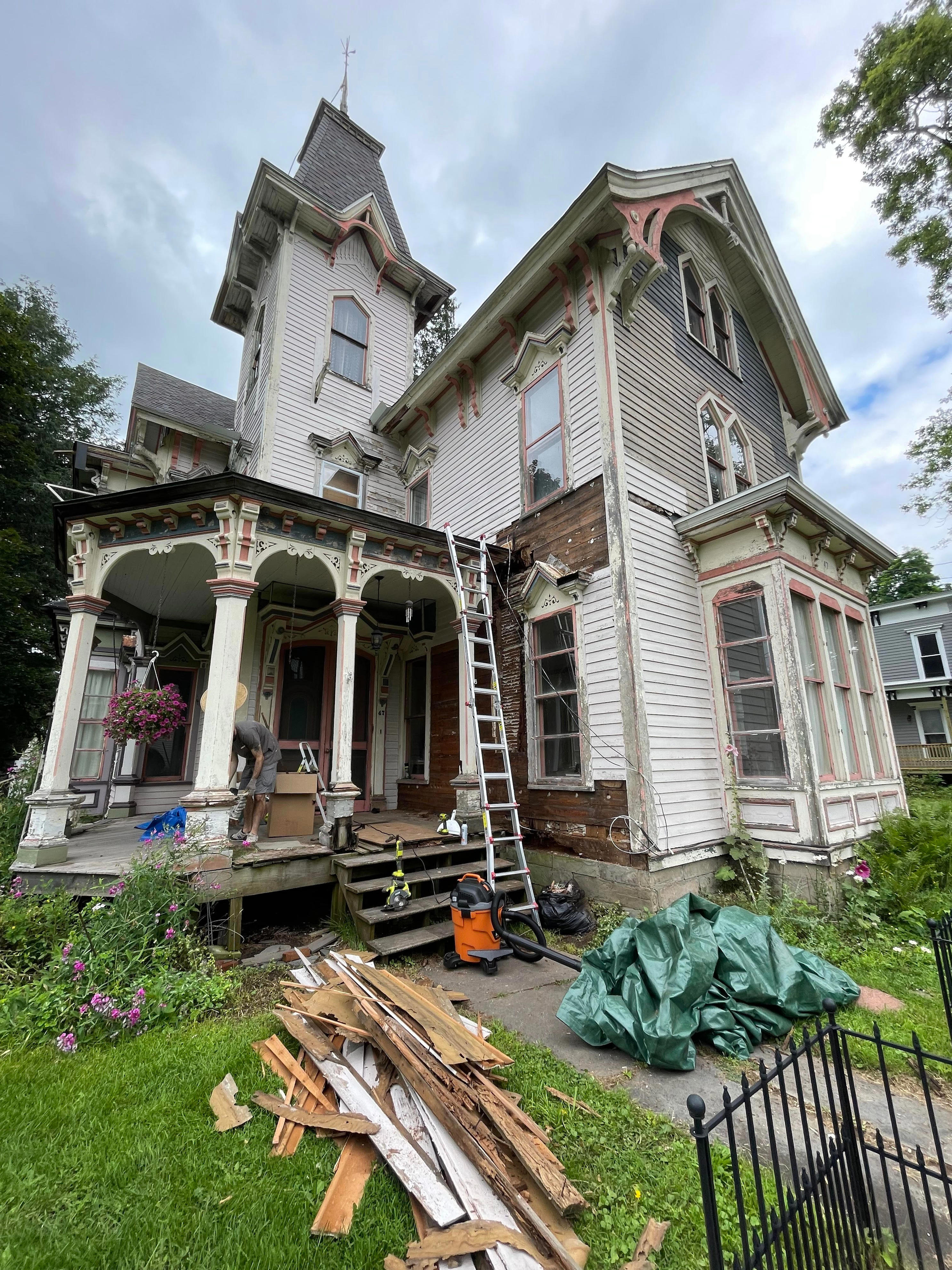 microsoft, a millennial couple considered hundreds of houses — then spent $150,000 on a falling-apart victorian sight unseen. they think it's worth it.