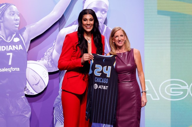 kamilla cardoso is red hot in suit and sandals at the 2024 wnba draft