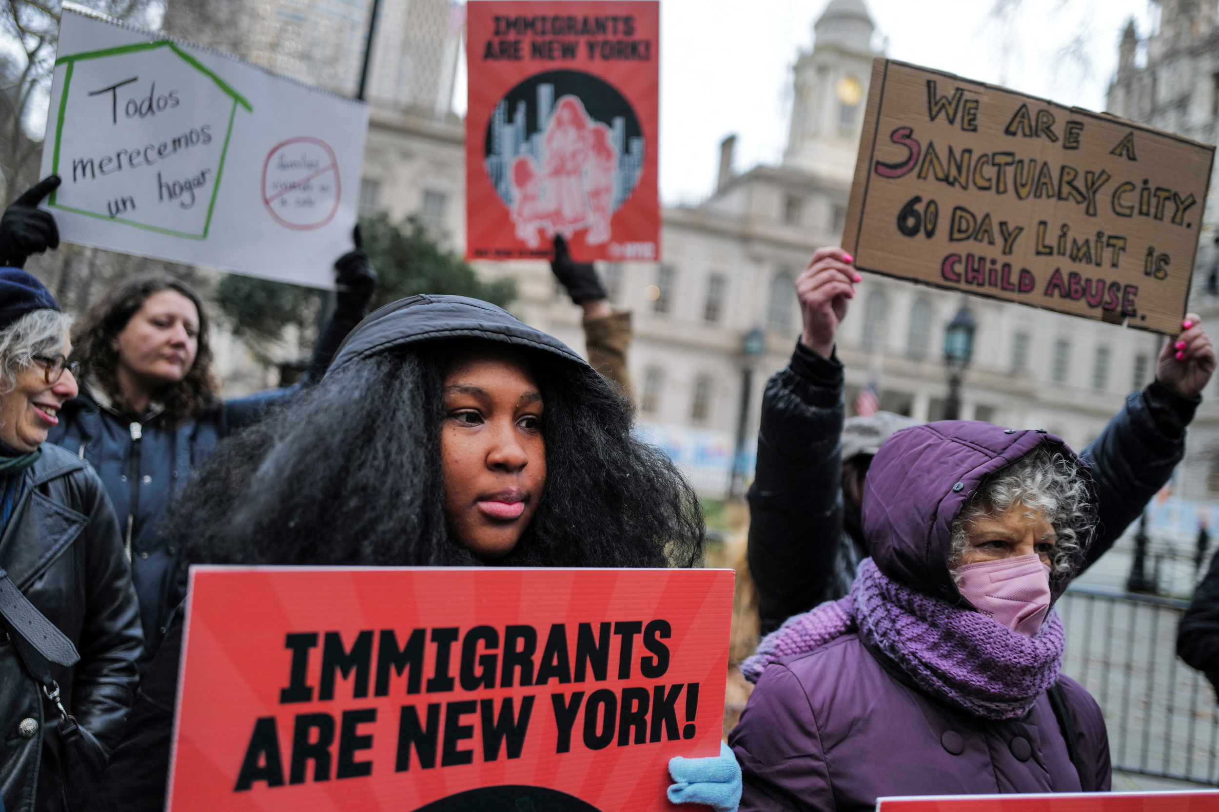 migrants descend on new york city hall: 'uproot anti-blackness'