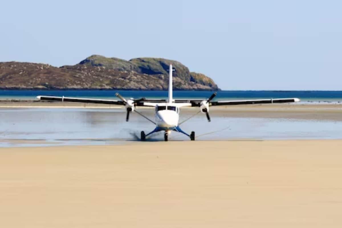 at this uk airport, flights land on a beach and runway disappears during high tides