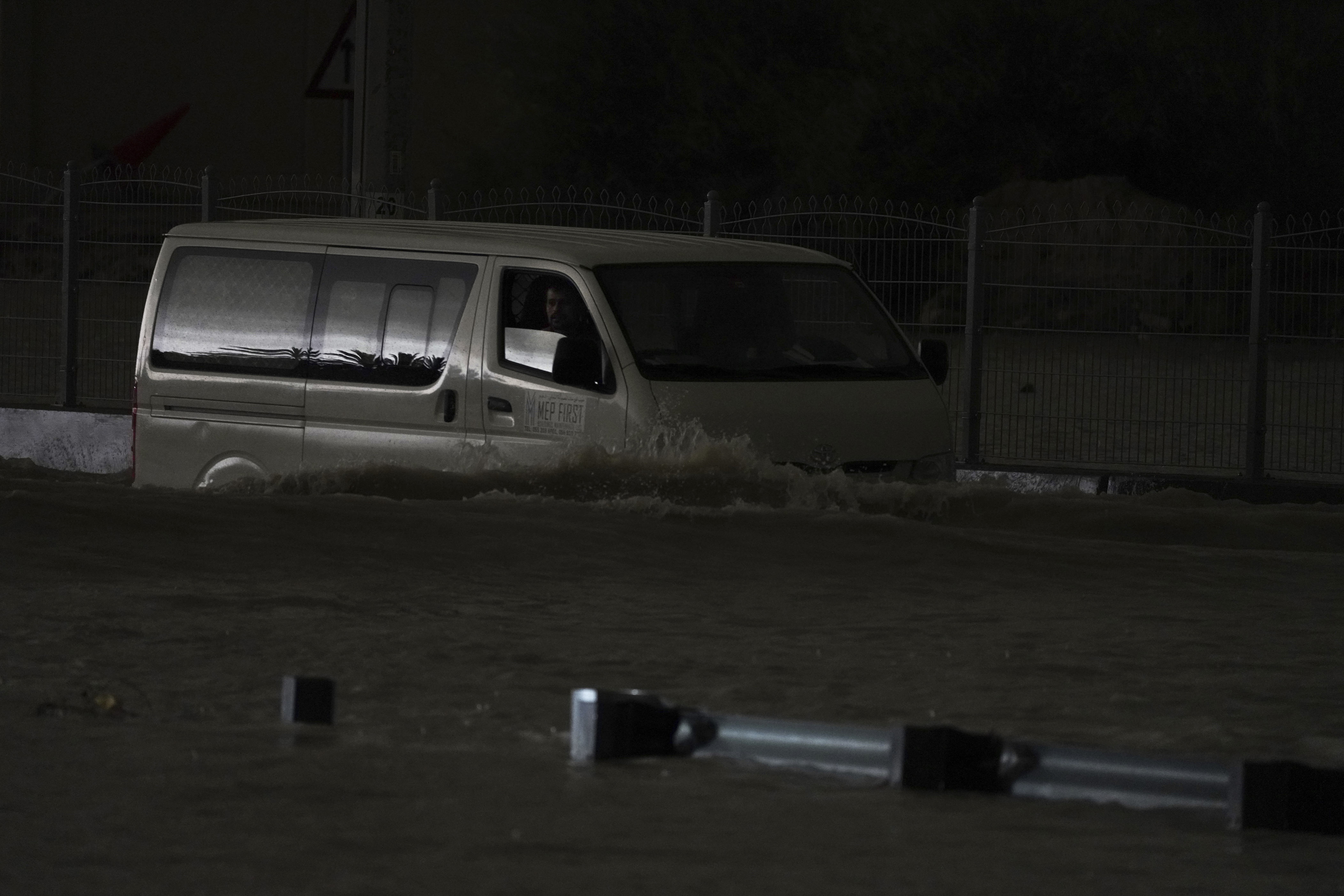 storm dumps heaviest rain ever recorded in desert nation of uae, flooding roads and dubai's airport