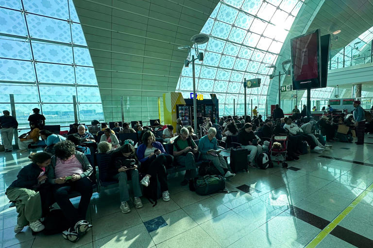 UAE rain causes travel chaos at Dubai Airport with runway flooded and ...